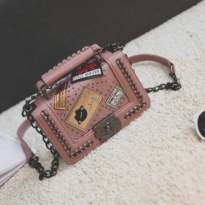 China Hot Selling Fashion Vintage Fashion Vintage Badge High Quality Rivet Tote Bag Chain PU Cross - Body Shoulder Bags Women for sale