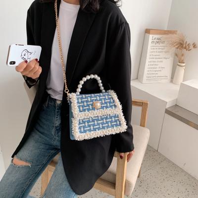 China 2021 New Fashion Style Fashion Pearl Korean Wild Pearl Chain Single Shoulder Clip Women's Handbags Ladies Messenger Square Hand Bags for sale