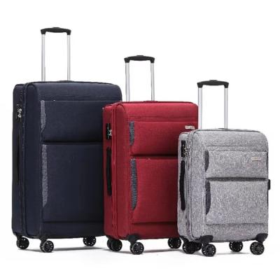 China Travel Travel Luggage Set Canvas Suitcase Fabric Luggage Background Set for sale