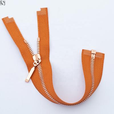 China Sustainable Custom Zip Tape Rose Gold Plated Recycle Brass Zipper With GRS Certificate for sale