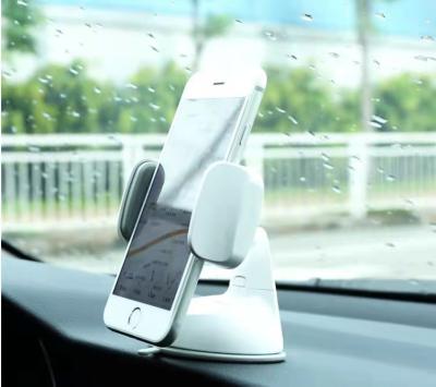 China Universal Dashboard and Windshield Adjustable ABS Car Mount Car Cell Phone Holder Stand for sale