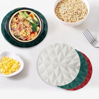 China New diamond-grain viable anti-skid, anti-heat and heat-resistant silicone round cup mat kitchen heat insulation products for sale