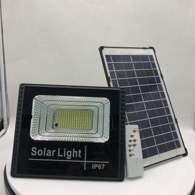 China Theme park high lumen aluminum ip65 solar power system led outdoor lighting solar floodlight with remote control for sale