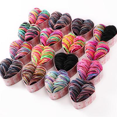 China 50pcs/box Soft Cute Baby Girls Rubber Elastic Hair Bands With Heart Shape Box for sale