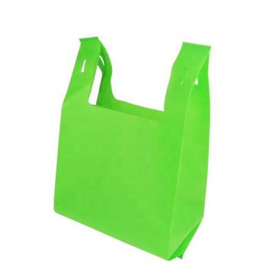 China OEM/ODM Logo Blank T-shirt Gift Grocery Carrier Non Woven Carrier Shopping Packaging Customized OEM/ODM Reusable Durable Strong Bag ECO Vest Style for sale