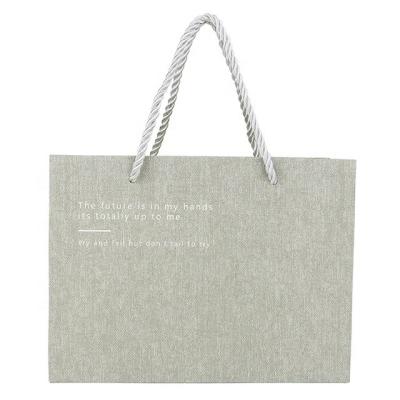 China OEM/ODM Biodegradable Grocery Packaging Gift Bag Custom Packaging Cardboard Shopping Bag With Handle for sale