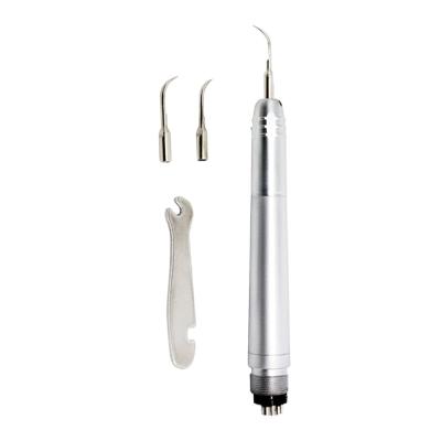 China Portable Dental Air Scaler Dental Calculus Removal Ultrasonic Handpiece With G1 G2 G4 Scaler Tip for sale