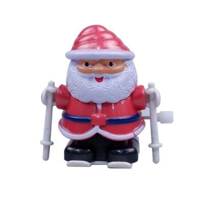 China Funny Kid Walking Props Cogs Toys Plastic Santa Wind Up Toy Christmas Gift for sale