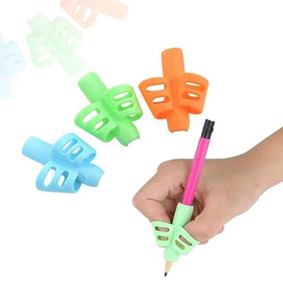 China Pen Making New Kids Silicone Pencil Grip Rubber Pencil Grips Soft Touch Writing Aid Children Writing for sale