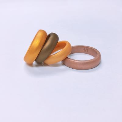 China Fashionable Finger Ring Metal Color Customized Silicone Color and Design Silicone Wholesale Wedding Ring for sale