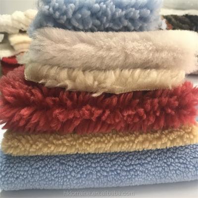 China Auto Upholstery Faux Fur Fabric By The Yard Long Pile Plush Fabric 160cm Soft Lightweight Short Clothing Fabric for sale