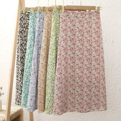 China Elegant Women's Breathable High Waist Printed Boho Floral Midi Skirt Elastic Waist Vacation Skirt Women's A-Line Wind Long Chic for sale