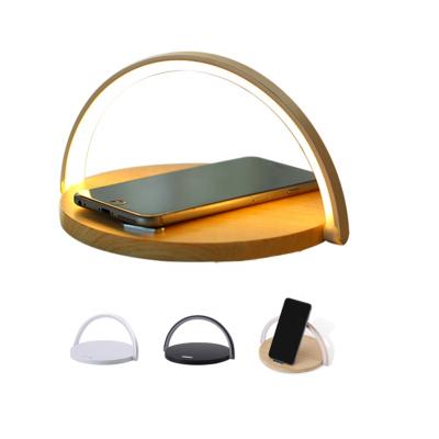 China Mobile Phone 3 in 1 Wireless Charger Desk Lamp Wooden Mobile Phone Stand Holder with Charger Radio for sale