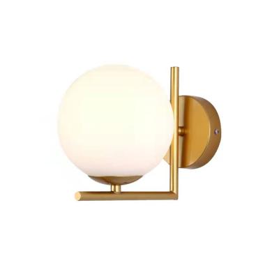 China Surface Mounted Minimalist Style Bedside Wall Lamp Bedroom Living Room Hotel Gold Wall Light for sale