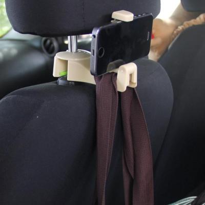 China Durable Hot Products Multifunctional Creative Novelty Car Hooks With Phone Holder for sale