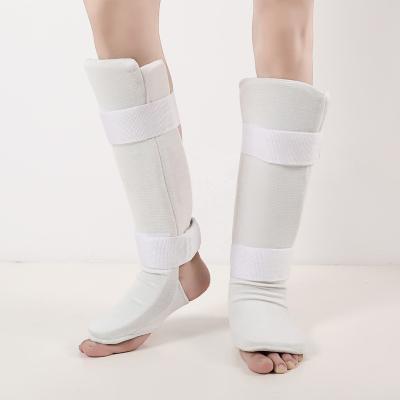 China High Elastic Wholesale Muay Karate Sanda Sport Shin Guard Custom Thai Muttahida Majlis-e-Amal With Bandage for sale