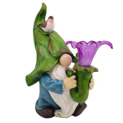 China Other Resin Solar Flower Bird Gnome Handmade Purple Garden Statue Solar Outdoor Decoration for sale