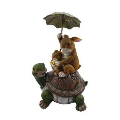 China Europe resin garden craft animal rabbit stand umbrella with solar LED garden statues bunny siiting on turtle figurines molds crafts for sale