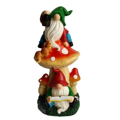 China Europe Garden Gnomes Statue With Big Solar Lights Funny Lawn Gnome Reading Book Under Mushroom Garden Sculpture Figurines for sale