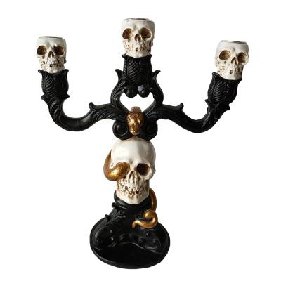 China High Quality Decoratiives Europe Halloween Skulls Candelabra and Snak Ornaments Holiday Resin Crafts Skulls Candelabra Sculpture for sale