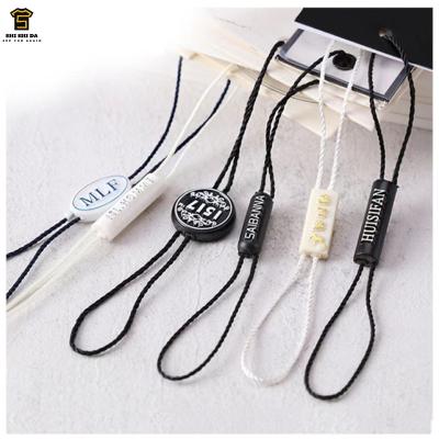 China Disposable custom plastic clothing hang tags cardboard label seal logo garment hang tags stringloop plastic clothing custom for sale