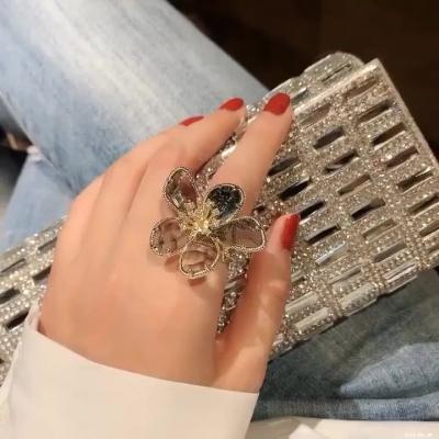 China /Sporty temperament crystal female fashion ring casual personality exaggerated flower open ladies ring index finger rings for sale