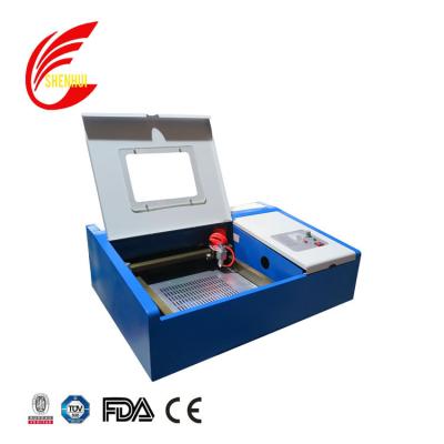 China Fast speed SHK40 40w mini acrylic CO2 usb laser engraving machine/desktop laser engraver for sale