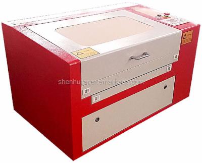 China Laser Engraving CO2 Cutter Desktop Laser Engraving Machine For Plastic for sale