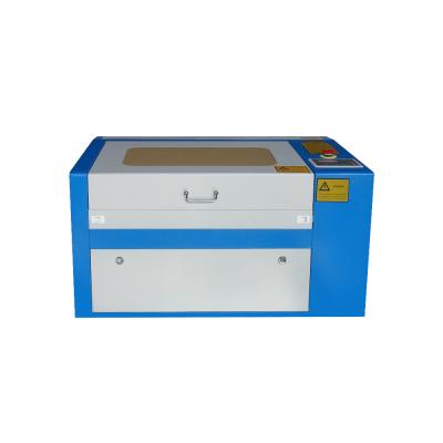 China laser engraving small size 60w 80w laser reci 4060 6040 460 640 laser engraving machine and laser cutting machine for sale