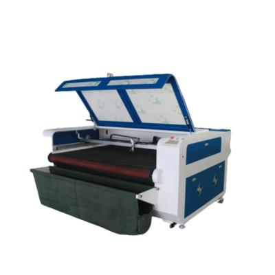 China Water Cooled Sealed CO2 Laser Tube Fabric Laser Cutting Machine With Auto Feeding Worktable for sale