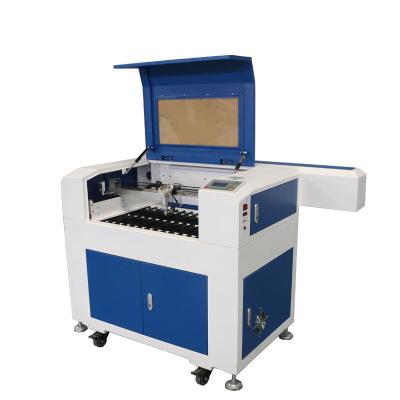 China Manufacturer Cheap 60w 80w Water Cooled Professional High Features Laser Engraving Machine for sale