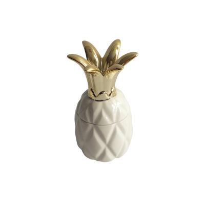 China Custom home decoration gold plating pineapple shaped ceramic china container pineapple jar jewelry storage box for sale