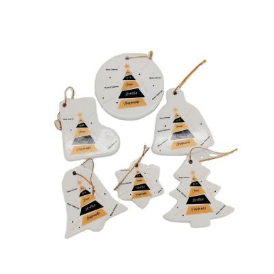 China Multi Shaped White Simple Ceramic Christmas Ornament Christmas Ornament For Decoration for sale