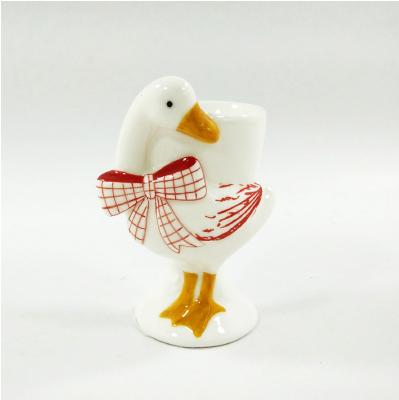 China Sustainable Ceramic Novelty Egg Cup Easter Duck Animal Shaped Egg Cup for sale