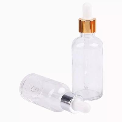 China Personal Care 5ml, 10ml, 15ml, 20ml, 30ml, 50ml Glass Dropper Bottle Clear Cosmetic Packaging Glass Bottle Empty Dropper for sale