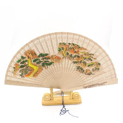 China China Best Selling Popular Lotus Wood Folding Hand Fans Customized Wooden Hand Fan Chinese Carved Folding Hand Fan for sale