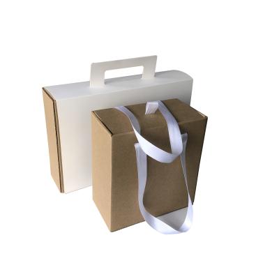 China Recycled Materials In Stock High Quality Recycle Customized Printing Color Custom Design Ribbon Flower Gift Handle Packaging Paper Box for sale