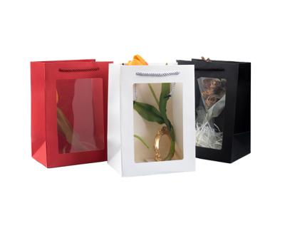 China Factory direct retail beverage custom high carrier logo paper packaging bags with window and handle for sale