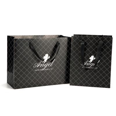 China Recyclable factory custom paper shopping bags with your own logo, printed with carry ribbon art black paper bag for sale