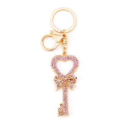 China Eco Friendly Fashion Craftsman Heart Shape Keychain Rhinestones Keychains Alloy Gold Plated Keychain for sale