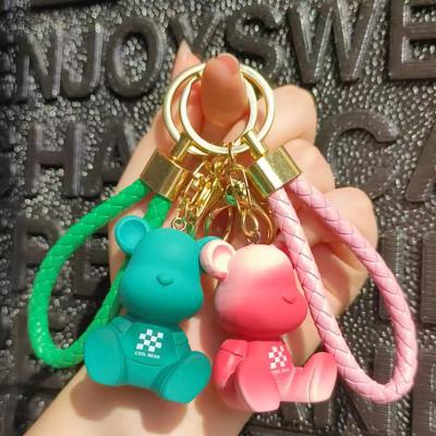 China Creative Gradient Chess Resin Bear Fashionable Craftsman Fashion Woven Rope Bag Pendant Car Key Chain Pendant for sale