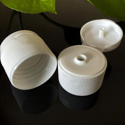 China Non Spill Plastic Bottle Use 24mm Lids Variety Ribbed And Smooth Surface Plastic Bottle Flip Cap for sale