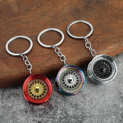 China Fashionable WoWei dynamics automobile refurbishing wheel hub simulation key chain pendant for car gift key chain ring for sale