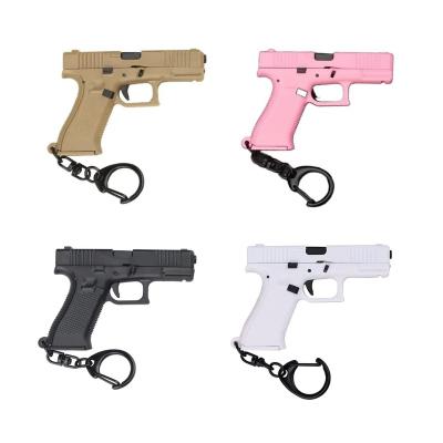 China Souvenir Gifts Promotion Wowei Tactical Pistol Form Key Chain Toy For Men Glock G45 Mini Portable Decorations Alloy 1:3 Weapons ABS Pendant for sale