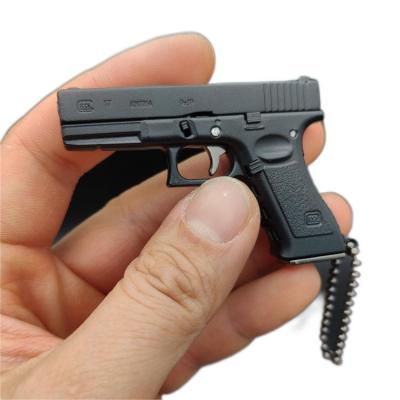 China Souvenir Gifts Promotion Wowei Mini Pistol Model G17 Glock Key Chain Action Number Toys Collectible Gift GU N Keychains Shooting Pendant For Men Army Fan for sale