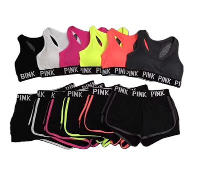 China Hot Selling Breathable Women Sports Suit Letter Sportswear Fitness Lift Up Short Female Running Bra Gym Workout Clothes for sale