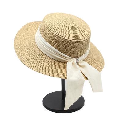 China Female Summer Barred Retro Straw Sun Hat Sunscreen Seaside French K368 Beach Hat 2022 Large Along The Sun Hat for sale