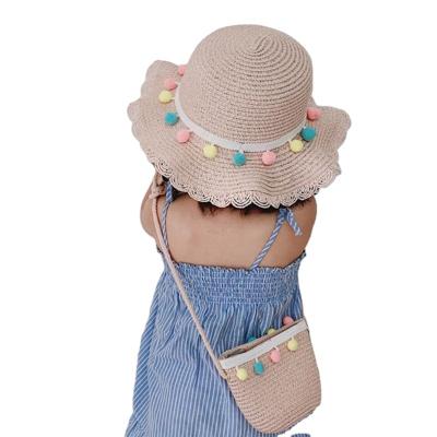 China K369 Kids Girls Big Brim Straw Woven Sun Protection Beach Floppy Ball Pompom Hat Summer Soft Disc Cap Colorful Wide Striped Bucket Hat for sale