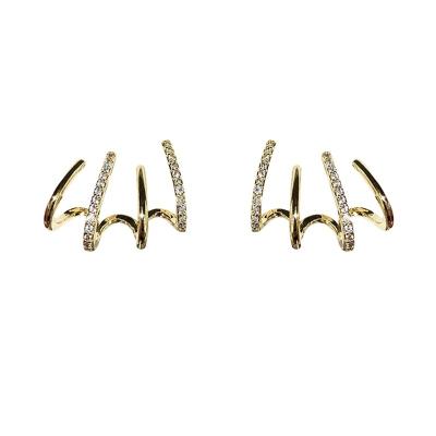 China Other K073 Luxury Earring Four Claw Ear Row Zirconia Inlay Advanced Design Sense Earrings Curve Earrings for sale