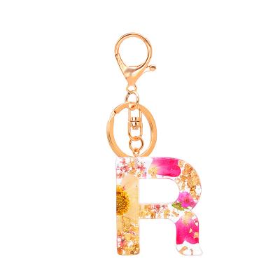 China Cute Gift K215 Letter Keychains Resin Key Chains Rings Women Car Acrylic Dry Flower Alphabet Keychain Holder Charm By Cute Glitter Pendant for sale